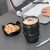 Caneca Lente Preta